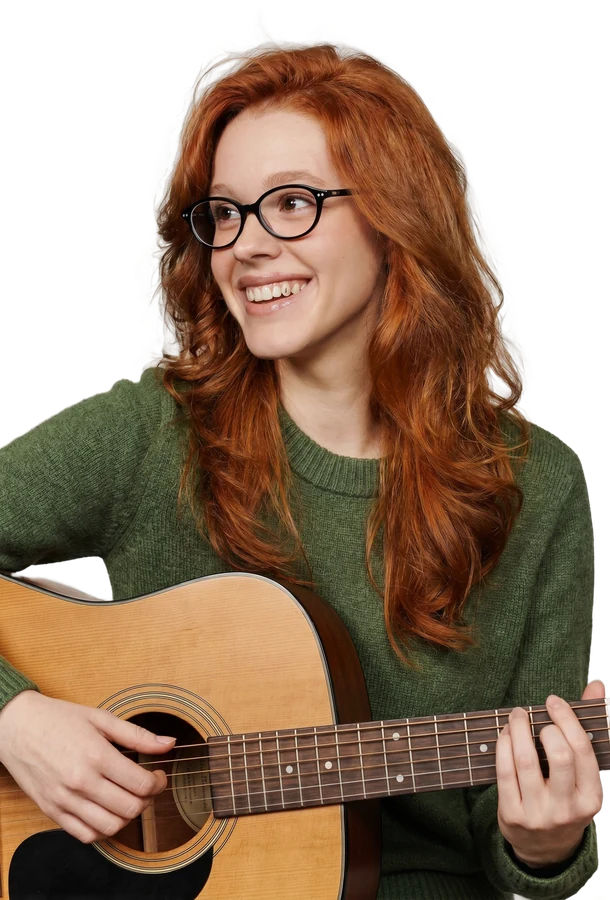 Worship musician playing guitar with Charts