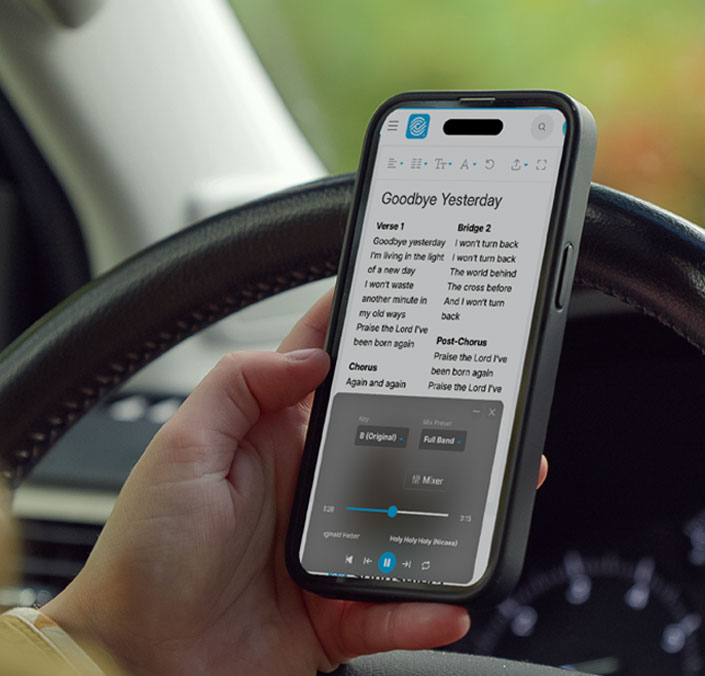 A musician practicing with the Rehearse app on a phone